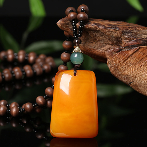 Autumn clothes deserve to act the role of the old wax long ebony necklace pendant amber folk decorative hanging pendant Christmas gift