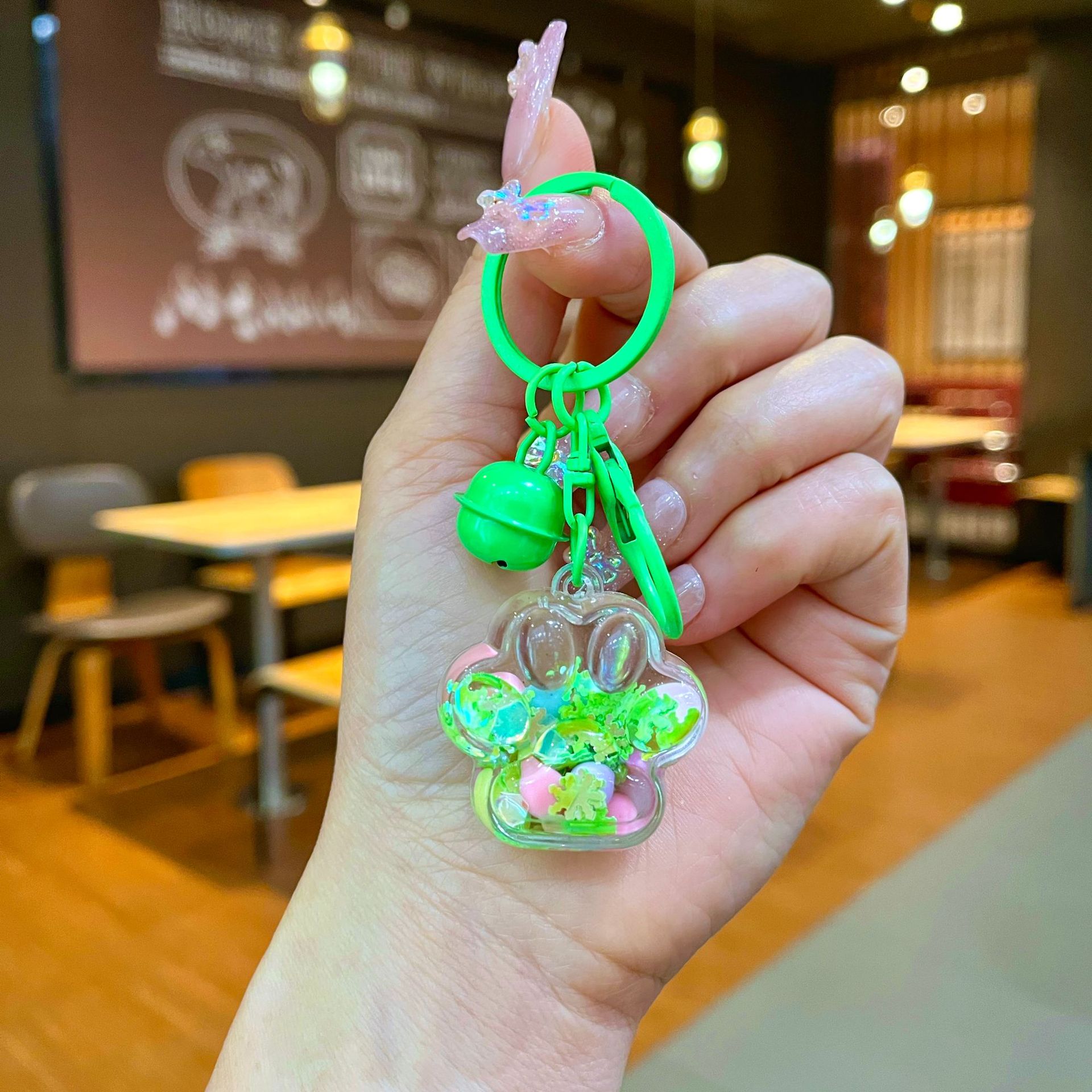 Aceite de gato garra arenas movedizas llavero lindo dibujos animados cadena colgante captura muñeca máquina agarrar pequeño regalo al por mayor