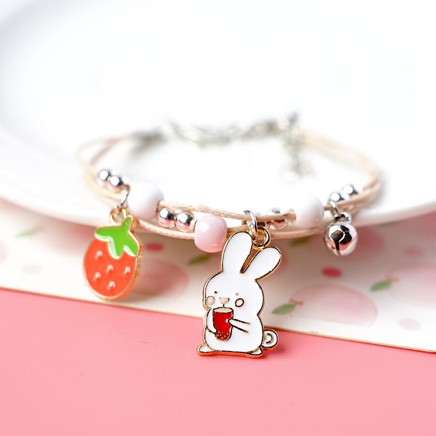 Primavera y verano, nueva pulsera de perro de canela japonesa y coreana, sentido de diseño de nicho femenino para enviar novias y amigas, pulsera de té con leche, conejo.