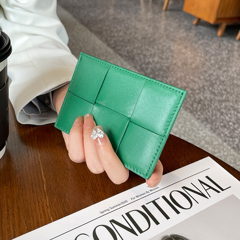 羊皮カードの薄いタイプの多カードの位置の小さい小銭入れの女性のシンプルなカードはカードを挟んで対外貿易のメーカーの直接販売の卸売りを包みます。
