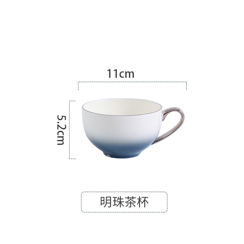 五つ星ホテル専用の高級ボーンチャイナ製色釉食器セット、グラデーショングレーと金縁の精巧な皿、ボウル、カップ|undefined