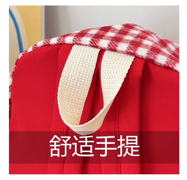 The large-capacity red woolen checkered backpack for primary and secondary school students is a unique and versatile choice. It's a trend for girls to carry backpacks during their leisure trips undefined