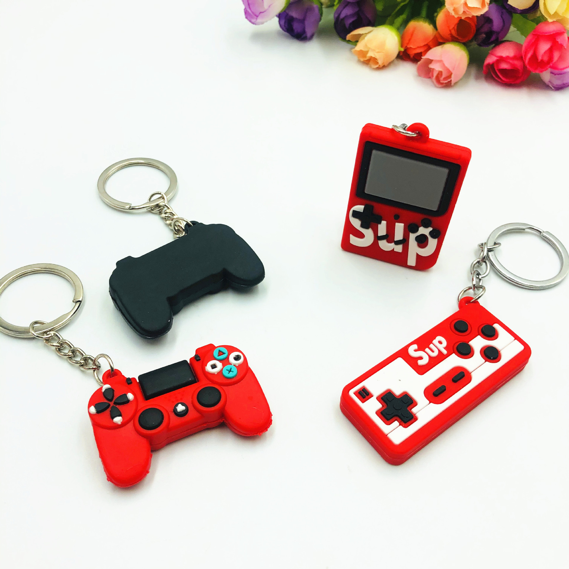 Transfronterizo PVC pegamento flexible simulación creativa máquina de juego a la antigua manija llavero bolso de los niños colgante pequeño regalo