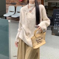 セーターのニットの女性の秋冬の新型の大きいサイズのvネックはゆったりしていて、だらだらしています。