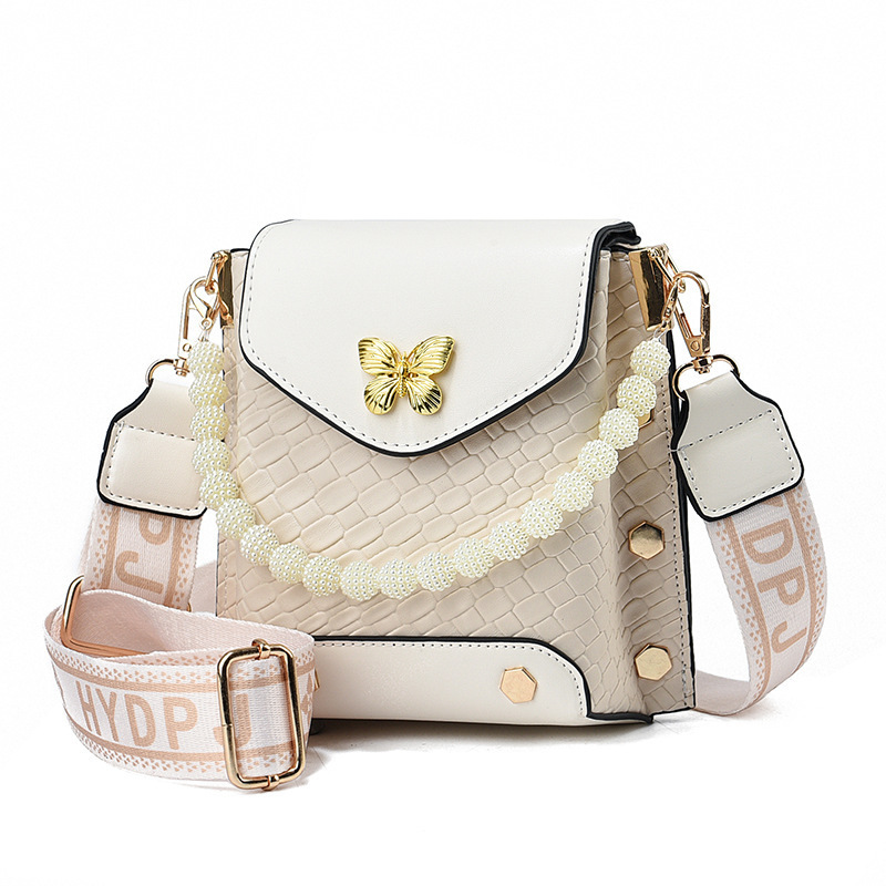 Otoño y invierno bolso de teléfono móvil de mujer 2025 nuevo estilo de moda bolso de hombro de moda universal mini bolso de aire exterior