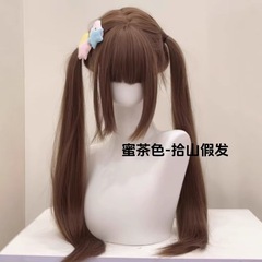 山のかつらを拾う85cmの前髪は鬢の角の蜜茶の亜麻の長い髪のlolitaの長いまっすぐな髪の柔らかい妹の全身のカバーの女性を持ちます。