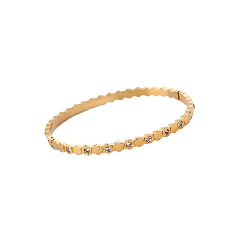 Accesorios personales europeos y estadounidenses transfronterizos hexagonales geométricos de panal de abeja suave aislamiento brazalete de acero de polietileno