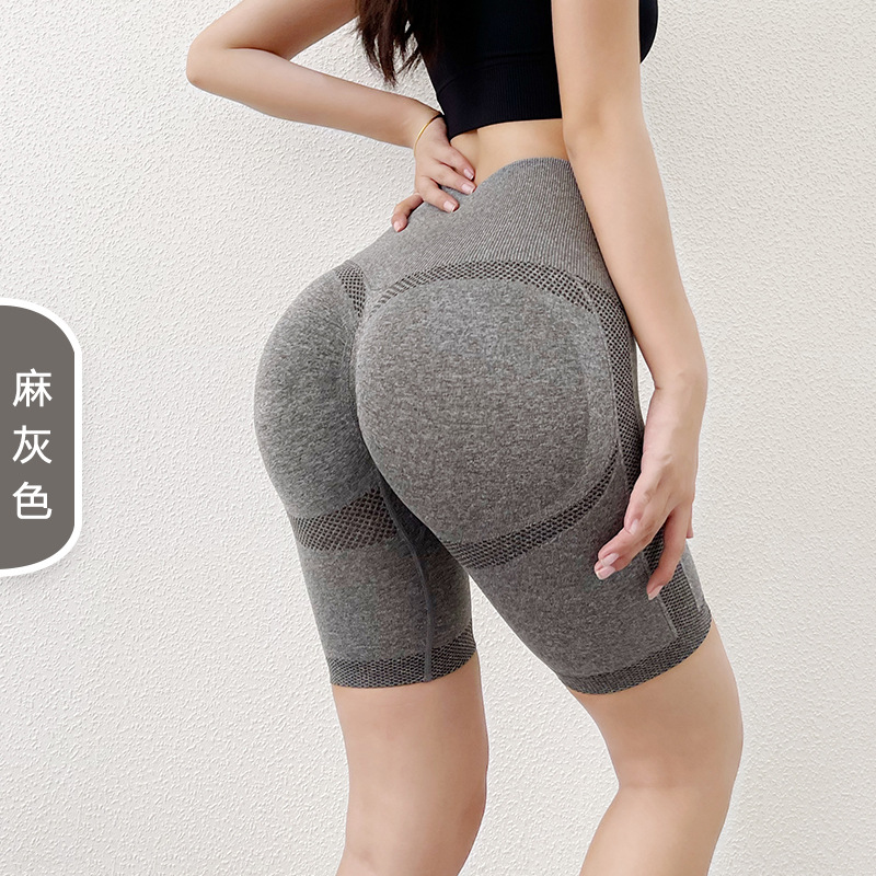 Celebridad de Internet europea y americana sin costuras Peach Hip pantalones de yoga de cinco puntos cintura alta estiramiento cadera medias deportivas Levantamiento de cadera pantalones de fitness