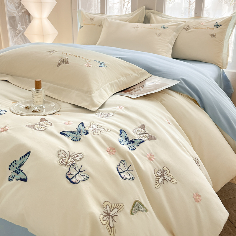 Cama de cuatro piezas de algodón puro algodón 2025 nuevo estilo ligero de lujo bordado funda edredón sábana ropa de cama de alta calidad traje de cuatro piezas ligero