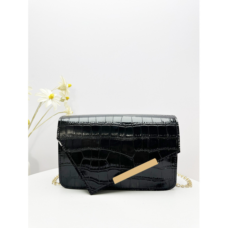 Una bolsa cuadrada con patrón de cocodrilo con tapa de tesoro de primavera y verano de 2025, nueva versión coreana de mujeres con un hombro inclinado, bolsa de cambio.