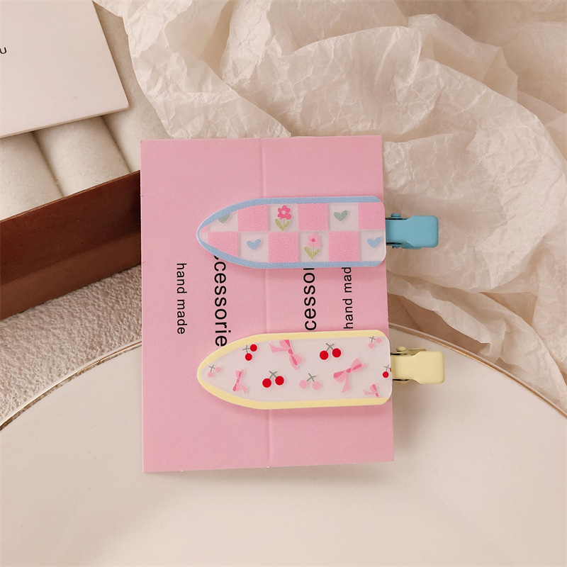 Un par de impresión de arco para niñas pinzas de cabello sin marcas de dibujos animados para mujeres adorables pinzas de cabello para el cabello de bordas rotas