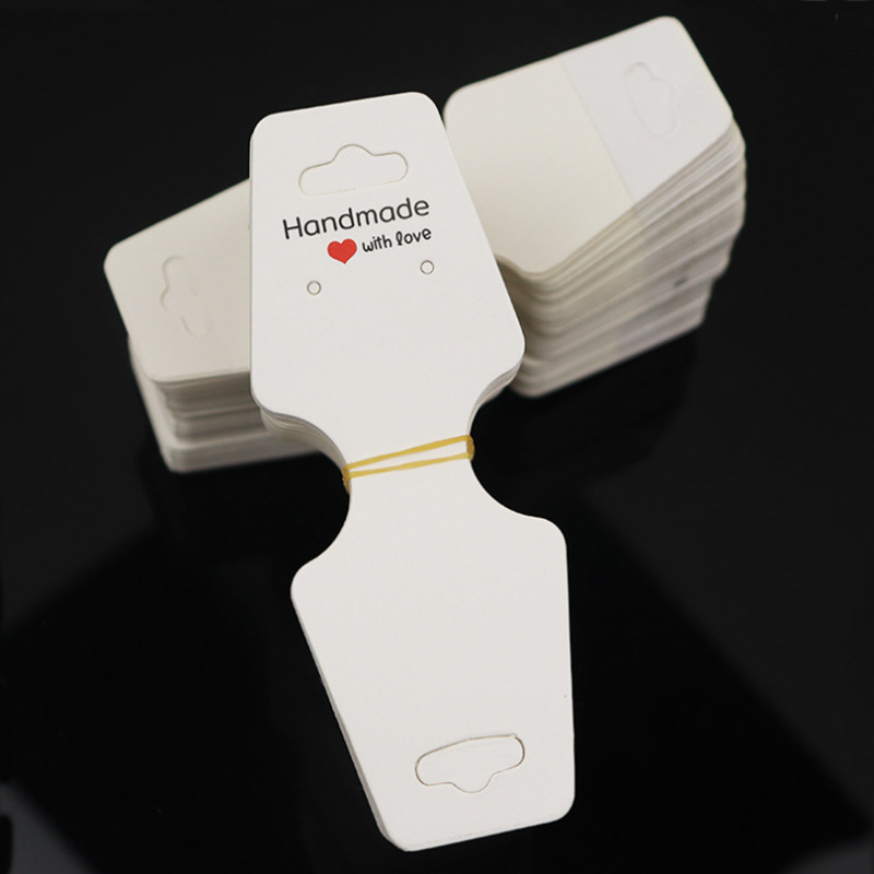 Tarjetas de joyería dobladas tarjetas de cinta adhesiva autoadhesiva tarjeta de elevación de joyería hecha a mano tarjeta de exhibición de explosión transfronteriza en stock