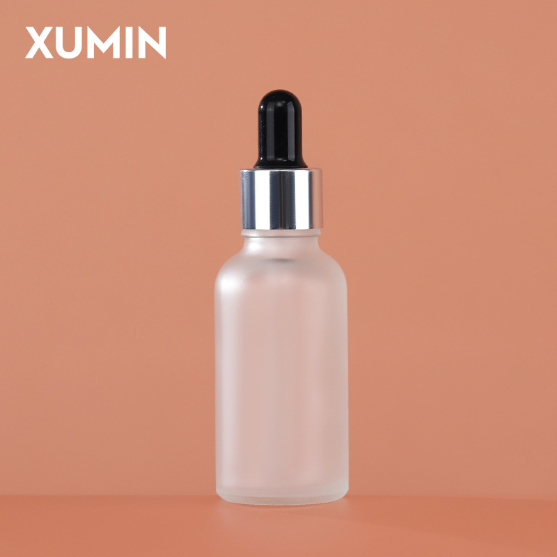 Embalaje cosmético botella de vidrio esmerizada botella de gotas líquidas de hombro redondo anillo de aluminio eléctrico botella de aceite esencial 30ml