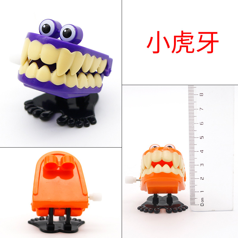 Juguetes dentales dientes de salto juguetes para niños juguetes de relojería dientes en forma de dientes saltando Rana regalos de jardín de infantes