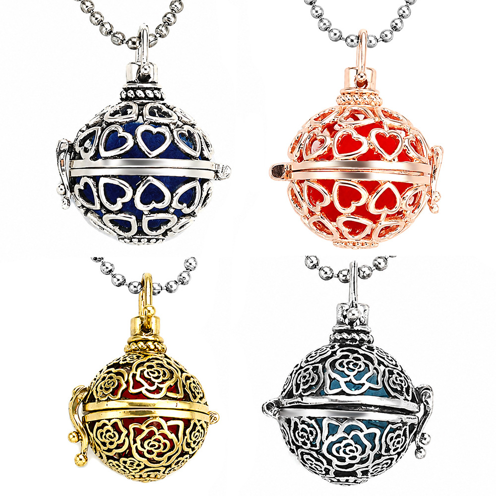Cross-border best-selling aromatherapy patterned heart-shaped cage hollow necklace essential oil diffuser perfume box for traditional Chinese clothing