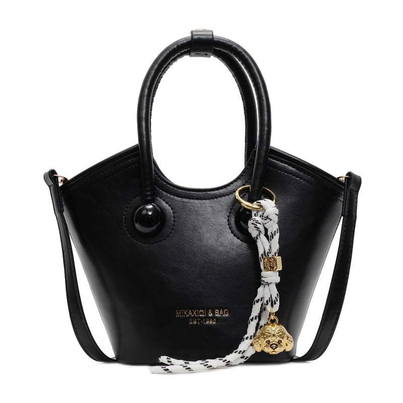 Bolsas de mano retro de color contrastante para mujeres 2025 nueva moda bolsas de hombro de estilo extranjero de alto nivel nicho bolsas de cubo