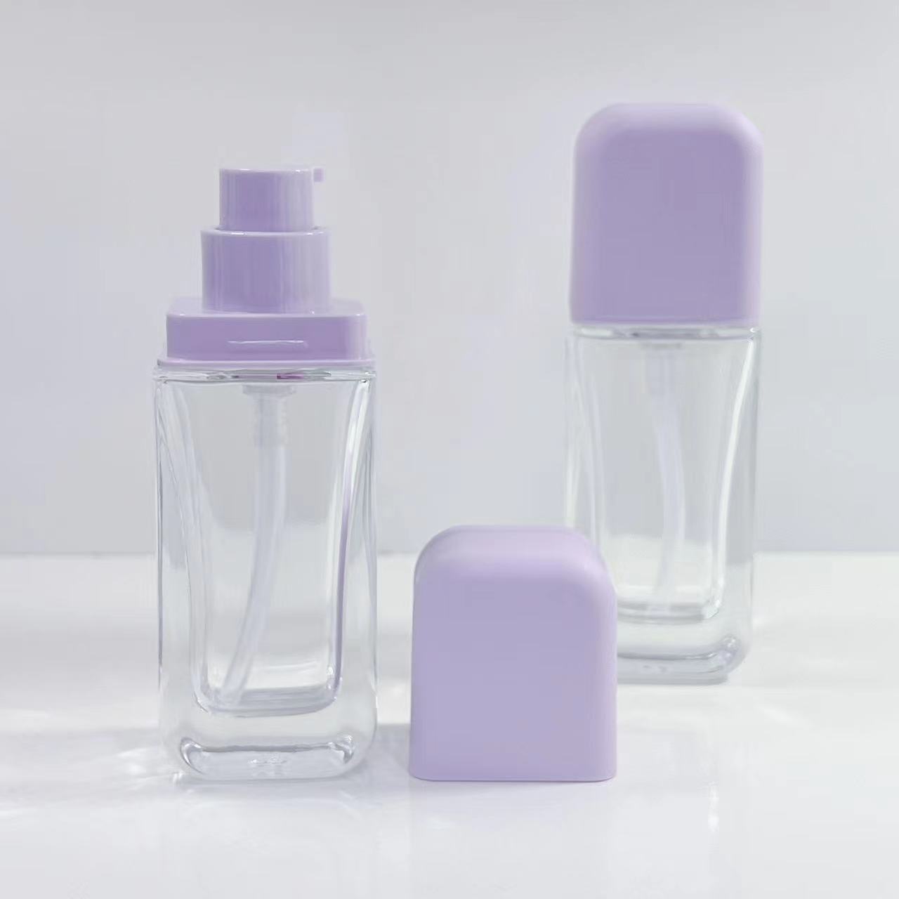 新款扁方圆角瓶粉底液玻璃瓶30ml 紫色蒙砂精华乳玻璃分装瓶