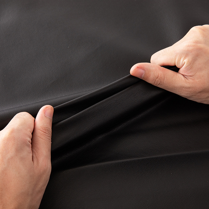 0.6仿蛋白皮PU布底180纹水洗皮料服装面料皮衣人造革质感布纹皮带