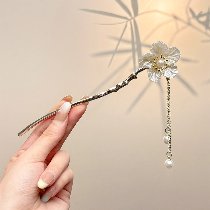 Nueva horquilla china 2025 nuevo estilo estilo antiguo horquilla mujer falda de cara de caballo de alta calidad estilo nacional horquilla de madera paso a paso horquilla tocado