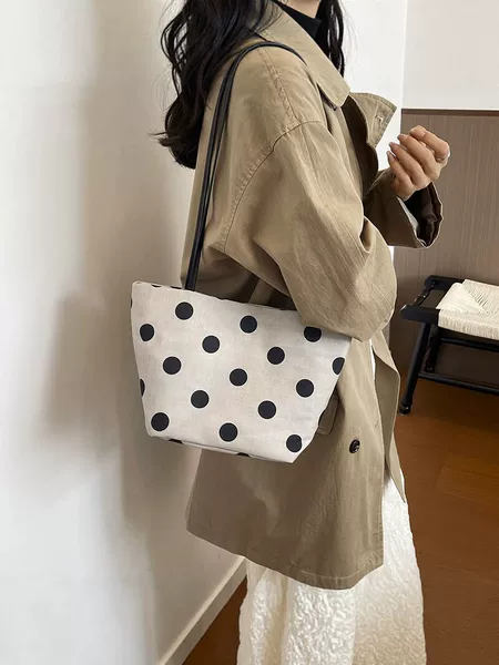 Korean-style polka dot canvas shoulder bag for women, large-capacity casual commuter tote bag, simple and versatile handbag wholesale