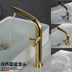 Sleek gold-plated luxury face basin faucet for bathroom, rotating cold and hot water tap, brass gold-colored, suitable for vanity and bathroom.