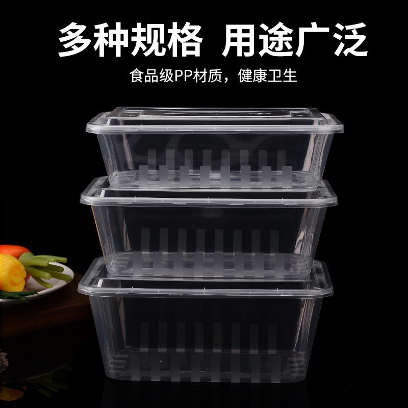 長方形の使い捨て弁当箱のプラスチックの外に持ち出して箱の大きいサイズの透明な食器のファーストフードの円形の弁当箱の蓋があります。|undefined