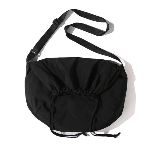 Stylish, versatile drawstring-closure crossbody bag with a minimalist, chic design—perfect for women. Bold-colored, lightweight, and easy-to-hold handbag option.