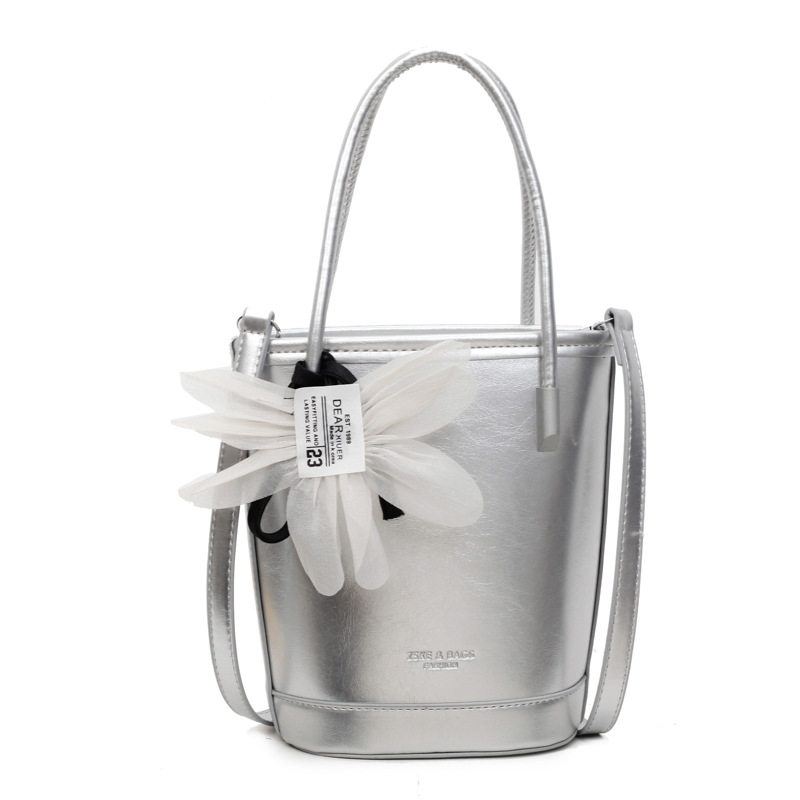 Bolso de moda personalizado bolso de cubo de textura de color sólido 2025 nuevo bolso de hombro de color sólido casual bolso de mensajero de cercanías