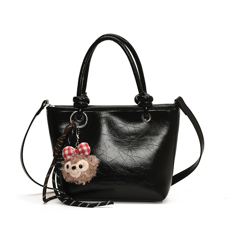 Bolso popular de este año para mujeres 2024 nueva moda versátil bolso de cubo de moda extranjera bolso de hombro portátil