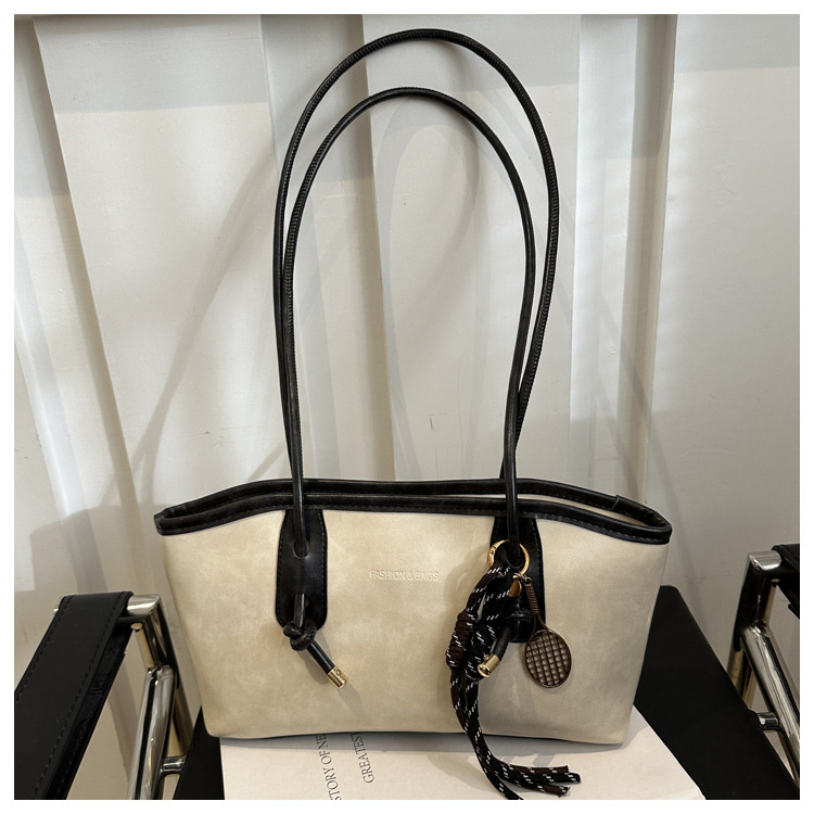 Commuting mujeres de color sólido 2024 nuevo otoño invierno retro moda texturas colgantes casuales de hombro bolso