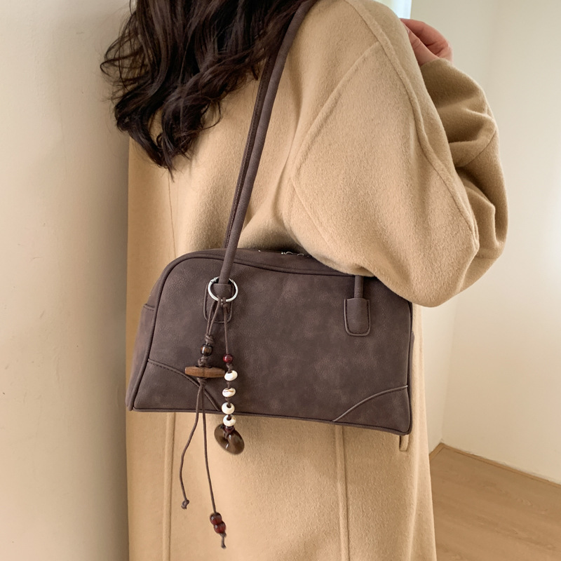 Bolsa de bolos de cuero de lona retro para mujeres 2025 invierno nuevo bolso de brazo de alta calidad bolso de almohada universal bolso de hombro image 4