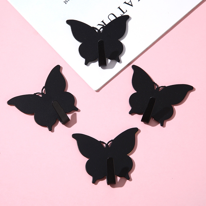 Gancho de mariposa fuerte sin agujeros ins viento encantador gancho adhesivo de corazón de niña decoración de pared de habitación gancho adhesivo de alto valor visual