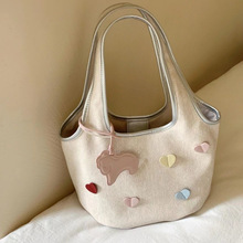 2025小众设计少女高颜值可爱菜篮子水桶包手提简约休闲百搭斜挎包