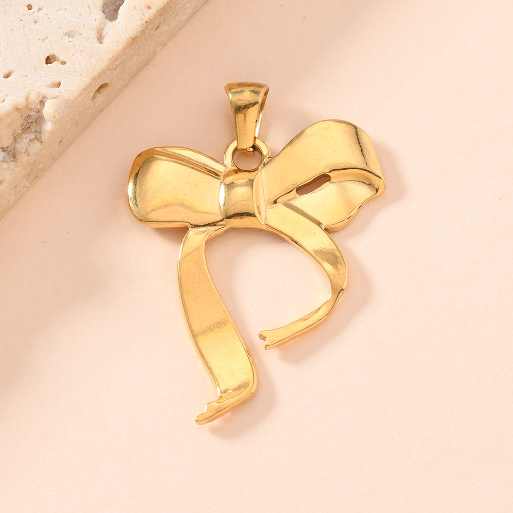 Colgante único estilo elegante arco colgante chapado 18k oro mariposa accesorios accesorios al por mayor