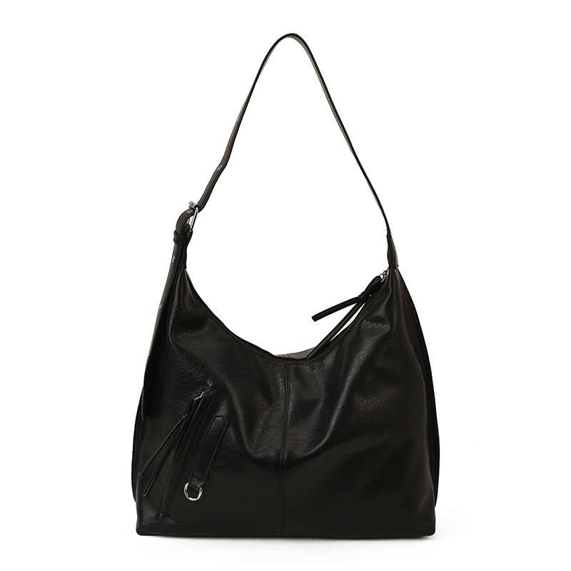 Bolsa de viaje retro de alta calidad para mujeres 2025 invierno nuevo estilo de moda multifuncional bolso de hombro de textura de moda bolso de brazo
