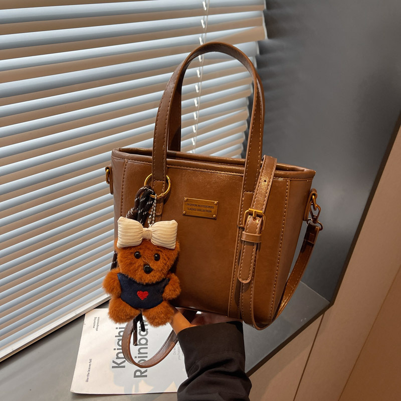 Bolso de mano retro de alto nivel, bolso de balde de agua universal, mujer, otoño y invierno 2025, nuevo tipo de bolso de hombro de moda, bolso de transporte de viaje