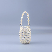 新品夏季编织串珠镂空水钻手提包轻巧小众设计百搭珍珠水钻手提包