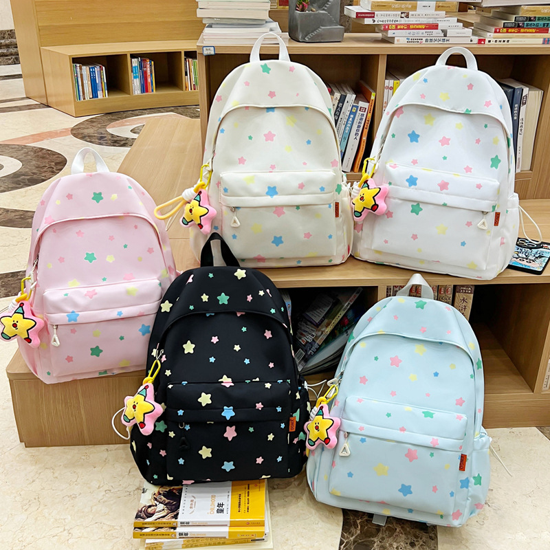 Nueva pequeña fresca mochila de estudiantes de secundaria alta capacidad de impresión ligera mochila de dibujos animados mochila de viaje