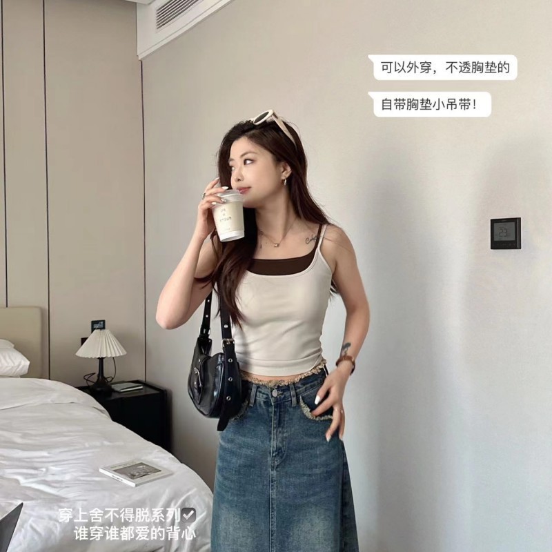 夏の重ね着式の衝突色の一体カップのベストの女性の春夏の快適な修身の純色の中で美背のガーターの女性を掛けます。
