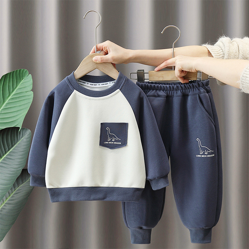 7105 traje de primavera para bebés 2025 nuevo suéter de manga raglán de dibujos animados para niños de dos piezas de primavera y otoño