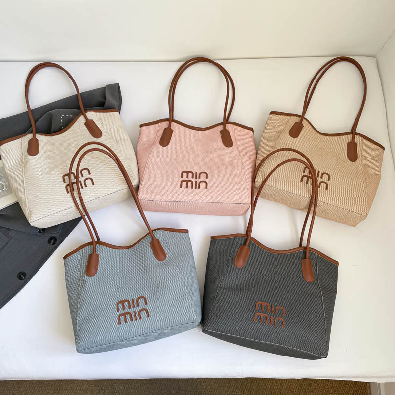 Nuevo tipo transfronterizo de gran capacidad de moda retro versátil de alto valor de la cara bolsas de hombro bolsas especiales para estudiantes universitarios