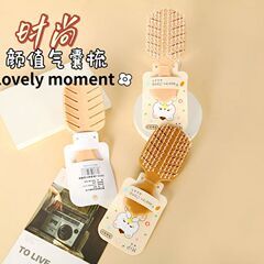 新商品の小さいエアクッションの櫛の美容の櫛の少女のかわいい携帯の小さい櫛のエアバッグは櫛の卸売りをマッサージします。