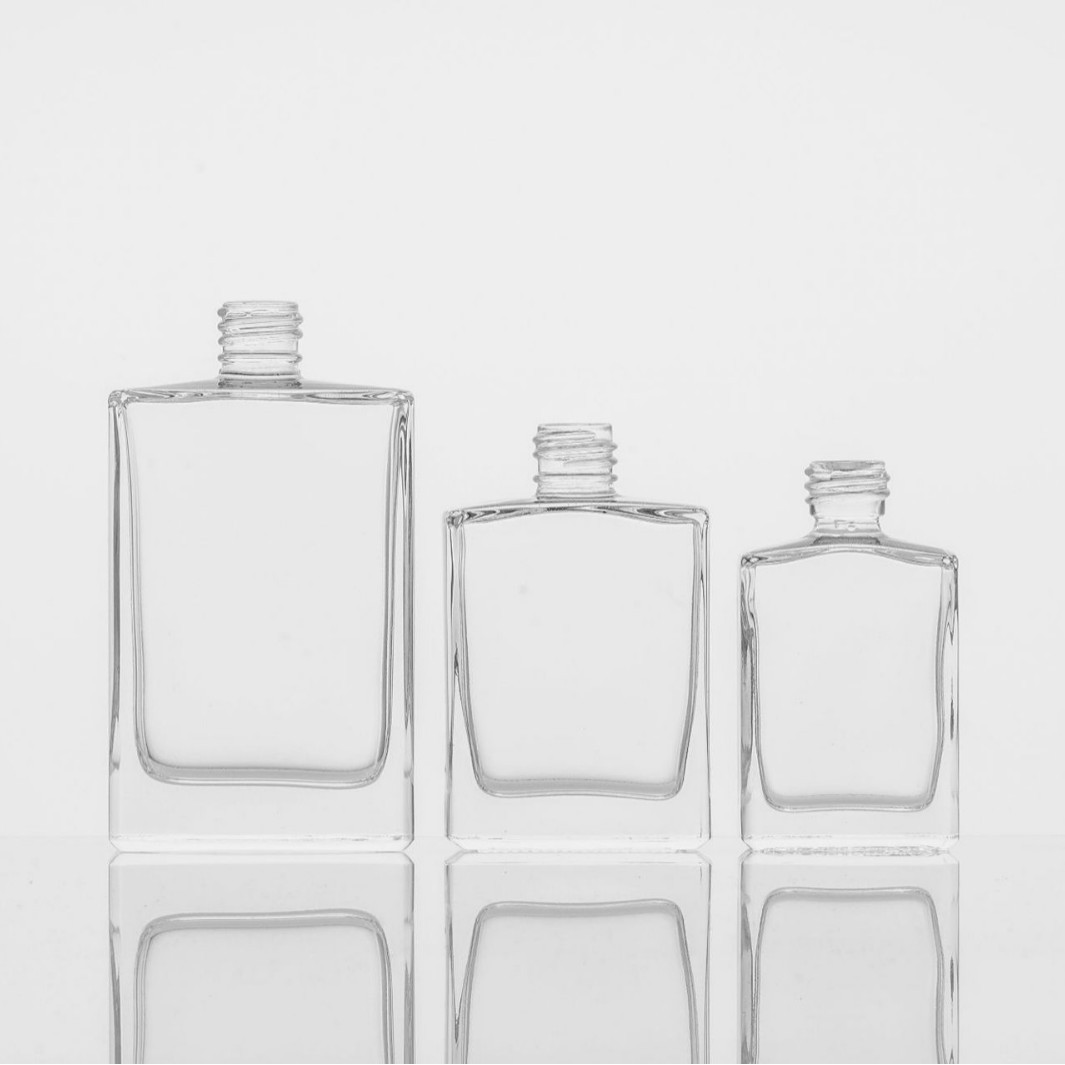 Botella de perfumes transparentes de tornillo botella de perfumes de vidrio de alta calidad botella de aceite esencial botella vacía botella de aerosol de pequeña capacidad