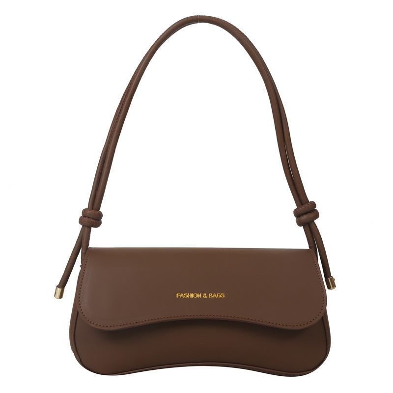 Bolso de diseño de nicho para mujeres 2024 verano nueva moda moda popular mochila de hombro bolso de hombro de viaje casual bolso de brazo