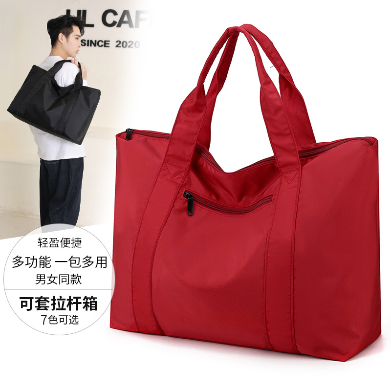 Venta al por mayor casual Oxford tela bolso de hombro 2022 nueva gran capacidad a prueba de salpicaduras bolsa de viaje portátil simple bolsa de viaje