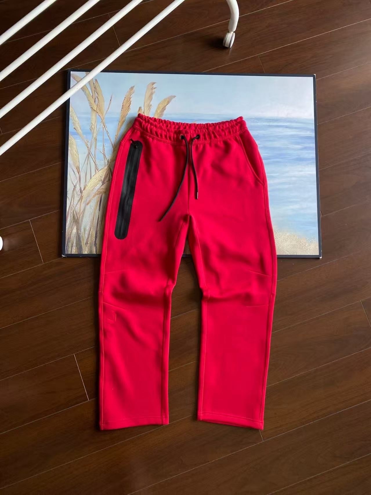 24 años de primavera y otoño para hombres nuevos pantalones de impresión rectos sueltos pantalones casuales de moda pantalones deportivos grandes pantalones de empalme