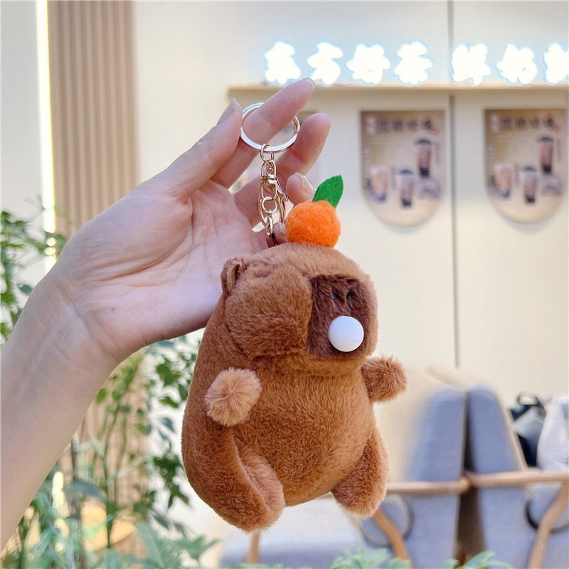 Kapibara puf puf pulseras Kapibara puff puff doll pellizco muñeco de peluche capibara colgante chirrido