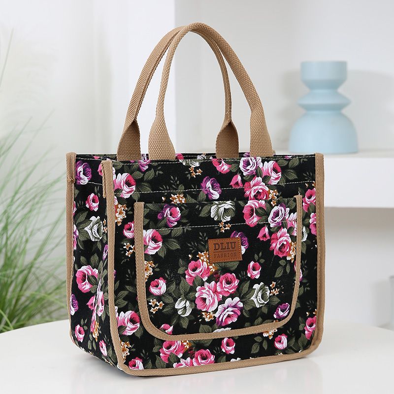The new thickened canvas handbag is suitable for carrying out by hand. It features an aluminum foil insulation layer and comes with a lunch box and lunch box details Picture