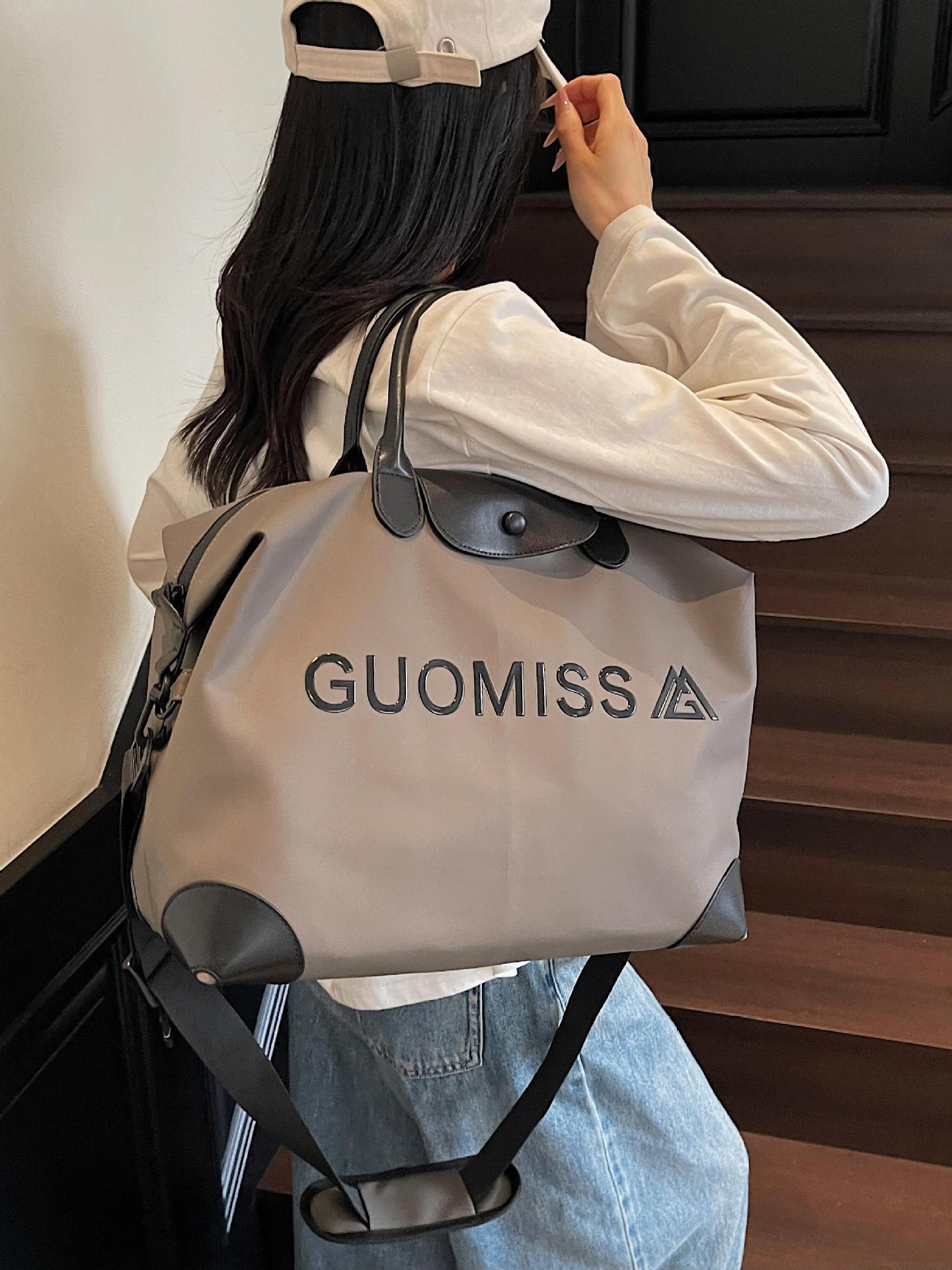 Bolsa de viaje para mujer transfronteriza nueva bolsa de gimnasio de yoga portátil de gran capacidad súper caliente bolsa de equipaje de viaje de corta distancia bolsa de mensajero