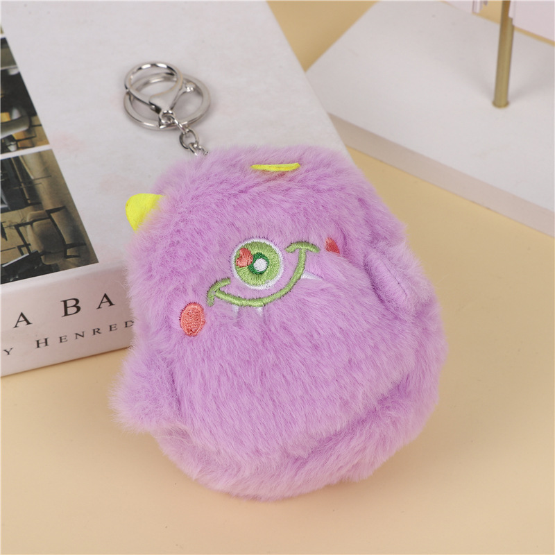 B121 Monster llavero - ojos verdes y morados